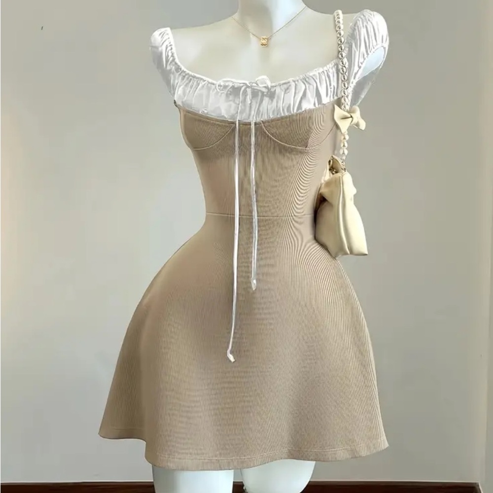 Elegant Beige Dress with White Accents